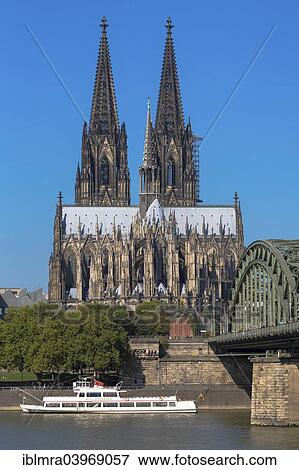 Stock Photo - "Cologne Cathedral with Hohenzollern bridge, Rhine at the front, Cologne, North Rhine-Westphalia, Germany, Europe". Fotosearch