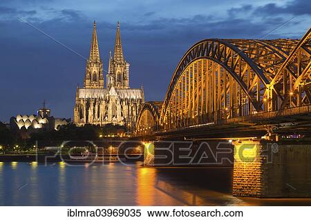 "Cologne Cathedral with Hohenzollern Bridge and Cologne Philharmonic Hall at dusk, the Rhine at the front, Cologne, North Rhine-Westphalia, Germany, Europe" View Large Photo Image Stock Photography - "Cologne Cathedral with Hohenzollern Bridge and Cologne Philharmonic Hall at dusk, the Rhine at the front, Cologne, North Rhine-Westphalia, Germany, Europe". Fotosearch