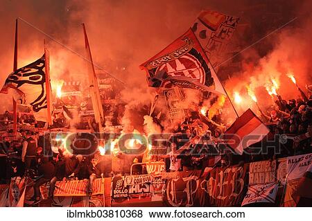 "Cologne fans burning flares, Esprit Arena, Dusseldorf, North Rhine-Westphalia, Germany, Europe" View Large Photo Image Stock Photo - "Cologne fans burning flares, Esprit Arena, Dusseldorf, North Rhine-Westphalia, Germany, Europe". Fotosearch