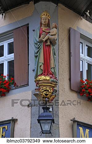 "Colored sculpture of Mary with the baby Jesus at the town hall, Rothenburg ob der Tauber, Middle Franconia, Bavaria, Germany, Europe" View Large Photo Image Stock Photo - "Colored sculpture of Mary with the baby Jesus at the town hall, Rothenburg ob der Tauber, Middle Franconia, Bavaria, Germany, Europe". Fotosearch