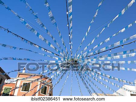 "Colorful garlands, Es Mercadal, Menorca, Balearic Islands, Spain, Southern Europe, Europe" View Large Photo Image Stock Image - "Colorful garlands, Es Mercadal, Menorca, Balearic Islands, Spain, Southern Europe, Europe". Fotosearch