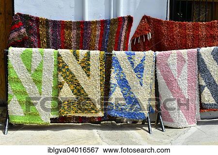 Stock Photo - "Colorful hand-woven carpets for sale, Capileira, Alpujarras, Sierra Nevada, Spain, Europe". Fotosearch