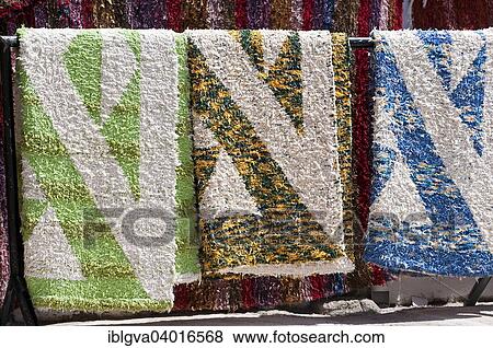 Stock Photo - "Colorful hand-woven carpets for sale, Capileira, Alpujarras, Sierra Nevada, Spain, Europe". Fotosearch