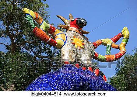 Picture - "Colorful sculpture in the Giardino dei Tarocchi or Garden of the Tarot, by Niki de Saint Phalle and Jean Tinguely in Capalbio, Province of Grosseto, Tuscany, Italy, Europe". Fotosearch