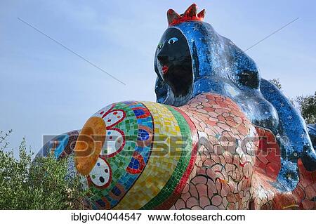 "Colorful sculpture in the Giardino dei Tarocchi or Garden of the Tarot, by Niki de Saint Phalle and Jean Tinguely in Capalbio, Province of Grosseto, Tuscany, Italy, Europe" View Large Photo Image Stock Photo - "Colorful sculpture in the Giardino dei Tarocchi or Garden of the Tarot, by Niki de Saint Phalle and Jean Tinguely in Capalbio, Province of Grosseto, Tuscany, Italy, Europe". Fotosearch