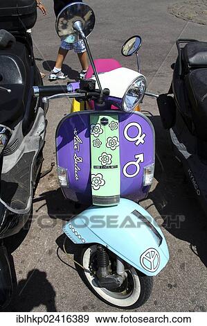 Colorful Vespa motor scooter, St. Tropez, French Riviera, France, Europe View Large Photo Image Stock Photo - Colorful Vespa motor scooter, St. Tropez, French Riviera, France, Europe. Fotosearch