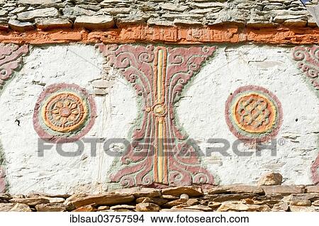 "Colorfully decorated Buddhist Stupa, detail of two lucky symbols, the wheel of life and endless knot, Chhyungkar Chorten at Ghiling, Upper Mustang, Nepal, Asia" View Large Photo Image Picture - "Colorfully decorated Buddhist Stupa, detail of two lucky symbols, the wheel of life and endless knot, Chhyungkar Chorten at Ghiling, Upper Mustang, Nepal, Asia". Fotosearch