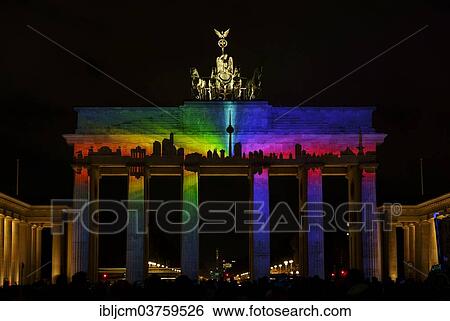 Stock Photograph - "Colorfully illuminated Brandenburg Gate, Mitte, Berlin, Berlin, Germany, Europe". Fotosearch