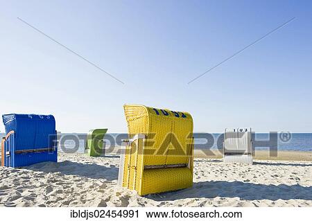 "Coloruful beach chairs on the beach near Wyk, Foehr Island, North Frisian Islands, Schleswig-Holstein, Germany, Europe" View Large Photo Image Stock Image - "Coloruful beach chairs on the beach near Wyk, Foehr Island, North Frisian Islands, Schleswig-Holstein, Germany, Europe". Fotosearch