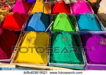 Stock Image - "Colour powder in different colors is displayed in heaps for sale, Mumbai, Maharashtra, India, Asia". Fotosearch