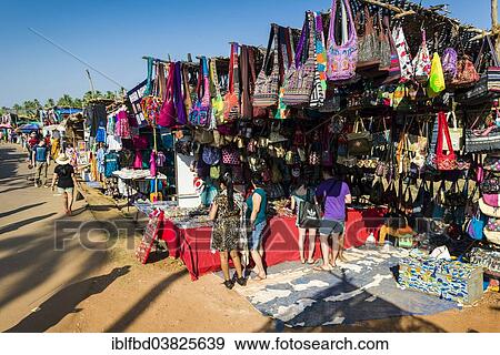 "Colourful bags for sale at the weekly flea market, Anjuna, Goa, India, Asia" View Large Photo Image Stock Photo - "Colourful bags for sale at the weekly flea market, Anjuna, Goa, India, Asia". Fotosearch