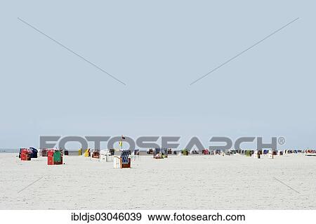 Stock Photo - "Colourful beach chairs on the beach, Norddorf, Amrum, Amrum, North Frisian Islands, Schleswig-Holstein, Germany, Europe". Fotosearch