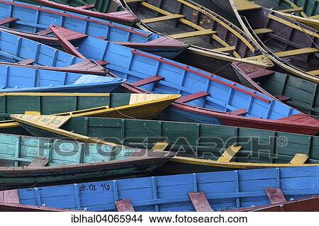 "Colourful boats on Phewa Lake, Phewa Tal or Fewa Lake, Pokhara, Nepal, Asia" View Large Photo Image Picture - "Colourful boats on Phewa Lake, Phewa Tal or Fewa Lake, Pokhara, Nepal, Asia". Fotosearch