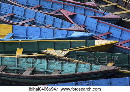 "Colourful boats on Phewa Lake, Phewa Tal or Fewa Lake, Pokhara, Nepal, Asia" View Large Photo Image Stock Photo - "Colourful boats on Phewa Lake, Phewa Tal or Fewa Lake, Pokhara, Nepal, Asia". Fotosearch