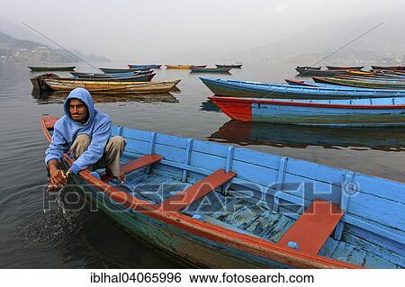 "Colourful boats on Phewa Lake, Phewa Tal or Fewa Lake, Pokhara, Nepal, Asia" View Large Photo Image Stock Photograph - "Colourful boats on Phewa Lake, Phewa Tal or Fewa Lake, Pokhara, Nepal, Asia". Fotosearch