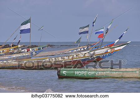 "Colourful fishing boats, Mama Beach, near Kent, Western Area, Sierra Leone, Africa" View Large Photo Image Stock Image - "Colourful fishing boats, Mama Beach, near Kent, Western Area, Sierra Leone, Africa". Fotosearch