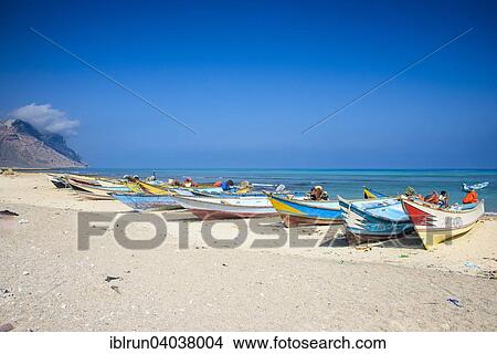 "Colourful fishing boats on the beach, Qalansia, island of Socotra, Yemen, Asia" View Large Photo Image Picture - "Colourful fishing boats on the beach, Qalansia, island of Socotra, Yemen, Asia". Fotosearch