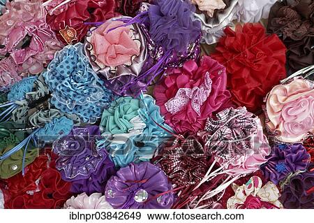 Stock Photo - "Colourful hair clips in a shop in the Muttrah Souq market, Muttrah, Muscat, Oman, Asia". Fotosearch