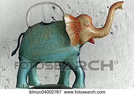 Colourful Indian elephant figure made of sheet metal View Large Photo Image Stock Photo - Colourful Indian elephant figure made of sheet metal. Fotosearch