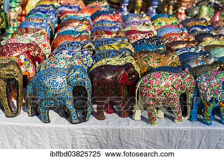 Stock Photography - "Colourful papier mache elephants for sale at the weekly flea market, Anjuna, Goa, India, Asia". Fotosearch