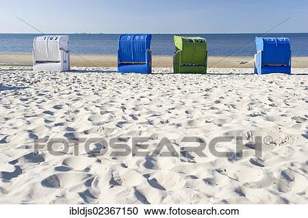 "Colourful roofed wicker beach chairs on the beach, Wyk, Foehr, North Frisia, Schleswig-Holstein, Germany, Europe" View Large Photo Image Stock Image - "Colourful roofed wicker beach chairs on the beach, Wyk, Foehr, North Frisia, Schleswig-Holstein, Germany, Europe". Fotosearch
