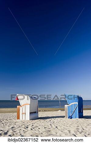 "Colourful roofed wicker beach chairs on the beach, Wyk, Foehr, North Frisia, Schleswig-Holstein, Germany, Europe" View Large Photo Image Stock Image - "Colourful roofed wicker beach chairs on the beach, Wyk, Foehr, North Frisia, Schleswig-Holstein, Germany, Europe". Fotosearch