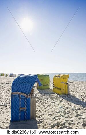 "Colourful roofed wicker beach chairs on the beach, Wyk, Foehr, North Frisia, Schleswig-Holstein, Germany, Europe" View Large Photo Image Stock Photo - "Colourful roofed wicker beach chairs on the beach, Wyk, Foehr, North Frisia, Schleswig-Holstein, Germany, Europe". Fotosearch