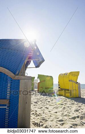 "Colourful roofed wicker beach chairs, Amrum, North Frisian Islands, Schleswig-Holstein, Germany, Europe" View Large Photo Image Stock Photo - "Colourful roofed wicker beach chairs, Amrum, North Frisian Islands, Schleswig-Holstein, Germany, Europe". Fotosearch