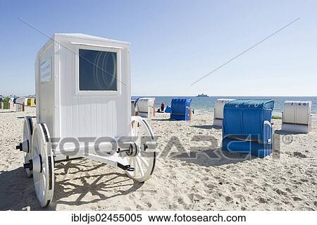 "Colourful roofed wicker beach chairs and a historical cabana on the beach near Wyk, Foehr Island, North Frisian Islands, Schleswig-Holstein, Germany, Europe" View Large Photo Image Stock Photography - "Colourful roofed wicker beach chairs and a historical cabana on the beach near Wyk, Foehr Island, North Frisian Islands, Schleswig-Holstein, Germany, Europe". Fotosearch