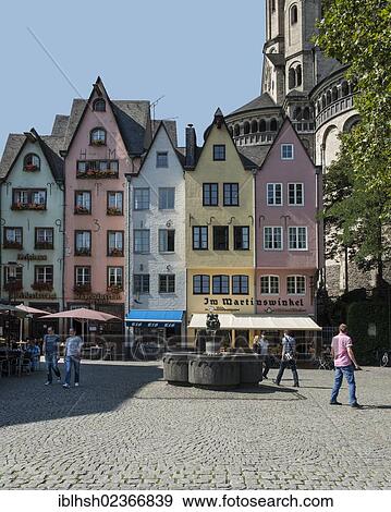 "Colourful row of houses in Martinswinkel, with the Romanesque Great St. Martin Church at the rear, Am Fischmarkt, Fish Market square, historic town centre, Cologne, North Rhine-Westphalia, Germany, Europe, PublicGround, Europe" View Large Photo Image Stock Photo - "Colourful row of houses in Martinswinkel, with the Romanesque Great St. Martin Church at the rear, Am Fischmarkt, Fish Market square, historic town centre, Cologne, North Rhine-Westphalia, Germany, Europe, PublicGround, Europe". Fotosearch