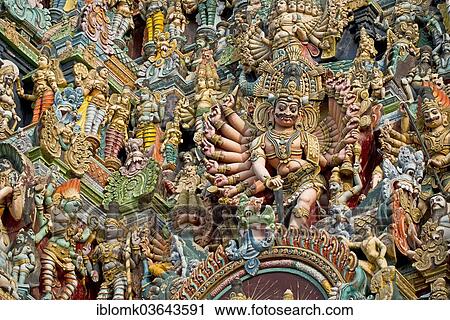 "Colourful statues of gods and demons on the Gopuram or Gopura gate tower, Meenakshi Amman Temple or Sri Meenakshi Sundareswarar Temple, Madurai, Tamil Nadu, India, Asia" View Large Photo Image Stock Image - "Colourful statues of gods and demons on the Gopuram or Gopura gate tower, Meenakshi Amman Temple or Sri Meenakshi Sundareswarar Temple, Madurai, Tamil Nadu, India, Asia". Fotosearch