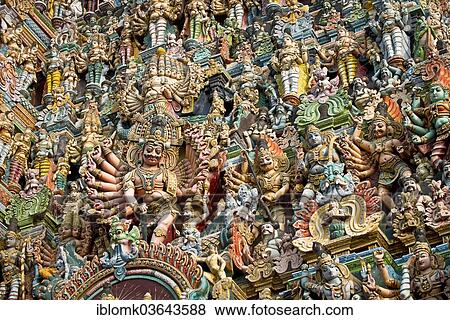 "Colourful statues of gods and demons on the Gopuram or Gopura gate tower, Meenakshi Amman Temple or Sri Meenakshi Sundareswarar Temple, Madurai, Tamil Nadu, India, Asia" View Large Photo Image Stock Photo - "Colourful statues of gods and demons on the Gopuram or Gopura gate tower, Meenakshi Amman Temple or Sri Meenakshi Sundareswarar Temple, Madurai, Tamil Nadu, India, Asia". Fotosearch