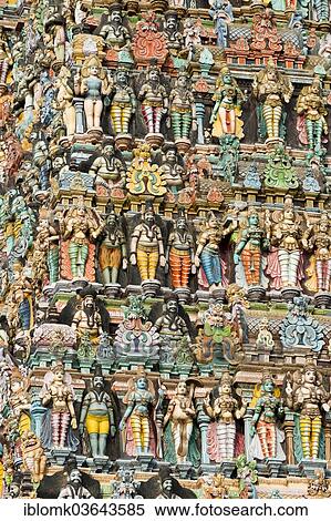 "Colourful statues of gods and demons on the Gopuram or Gopura gate tower, Meenakshi Amman Temple or Sri Meenakshi Sundareswarar Temple, Madurai, Tamil Nadu, India, Asia" View Large Photo Image Stock Photography - "Colourful statues of gods and demons on the Gopuram or Gopura gate tower, Meenakshi Amman Temple or Sri Meenakshi Sundareswarar Temple, Madurai, Tamil Nadu, India, Asia". Fotosearch