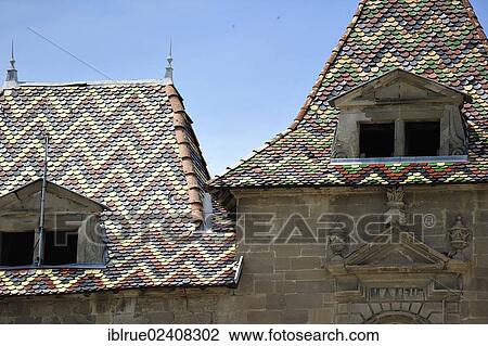Stock Image - "Colourful tiled roofs, Saint-Antoine-l? Æ'Abbaye, France, Europe". Fotosearch