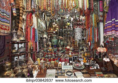 "Colourful wares and souvenirs in a shop in the Muttrah Souq market, Muttrah, Muscat, Oman, Asia" View Large Photo Image Stock Photo - "Colourful wares and souvenirs in a shop in the Muttrah Souq market, Muttrah, Muscat, Oman, Asia". Fotosearch