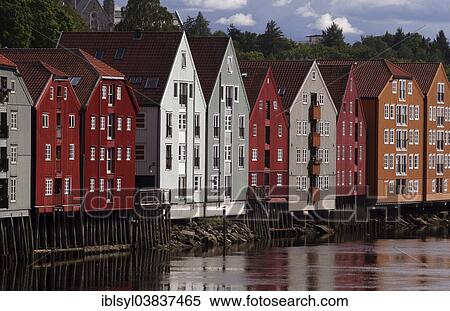 "Colourful wooden houses on stilts on the Nidelv River, Trondheim, Norway, Scandinavia, Europe" View Large Photo Image Stock Photography - "Colourful wooden houses on stilts on the Nidelv River, Trondheim, Norway, Scandinavia, Europe". Fotosearch