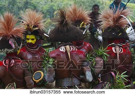 "Colourfully decorated and painted men celebrating the traditional Sing Sing in the highlands, Paya, Highlands, Papua New Guinea, Oceania" View Large Photo Image Stock Photography - "Colourfully decorated and painted men celebrating the traditional Sing Sing in the highlands, Paya, Highlands, Papua New Guinea, Oceania". Fotosearch