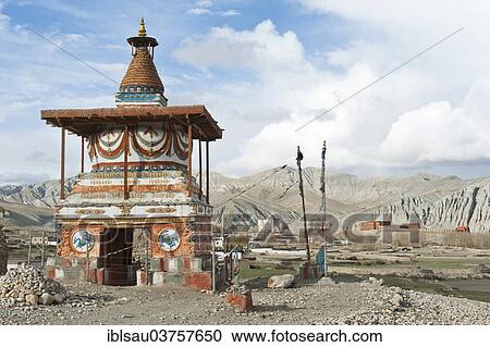Stock Image - "Colourfully decorated Buddhist stupa at the entrance to the village, gate chorten, Charang, Tsarang, Upper Mustang, Nepal, Asia". Fotosearch