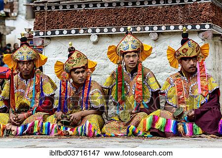 "Colourfully dressed monks watching the opening ceremony of the Hemis Festival, Hemis, Ladakh, Jammu and Kashmir, India, Asia" View Large Photo Image Stock Photo - "Colourfully dressed monks watching the opening ceremony of the Hemis Festival, Hemis, Ladakh, Jammu and Kashmir, India, Asia". Fotosearch