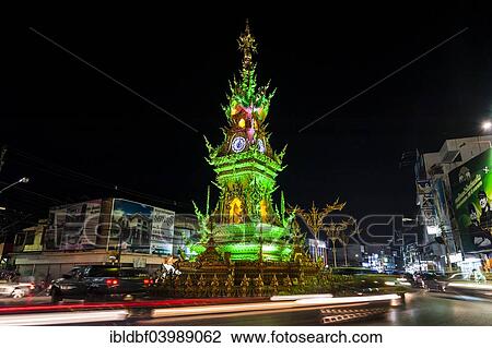"Colourfully illuminated Clock Tower at night with light trails of vehicles, Wiang Mueang, Chiang Rai Province, Chiang Rai Province, Northern Thailand, Thailand, Asia" View Large Photo Image Stock Image - "Colourfully illuminated Clock Tower at night with light trails of vehicles, Wiang Mueang, Chiang Rai Province, Chiang Rai Province, Northern Thailand, Thailand, Asia". Fotosearch