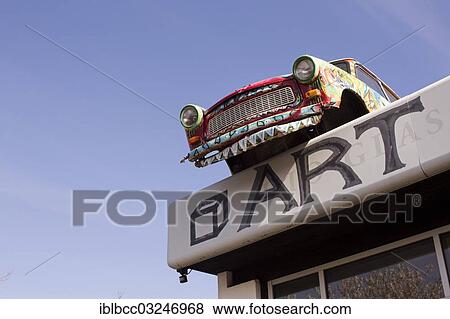 "Colourfully painted Trabant car, on roof of an art gallery, Bornholm, Svaneke |Svaneke|, Region Hovedstaden, Denmark, Europe" View Large Photo Image Stock Photo - "Colourfully painted Trabant car, on roof of an art gallery, Bornholm, Svaneke |Svaneke|, Region Hovedstaden, Denmark, Europe". Fotosearch