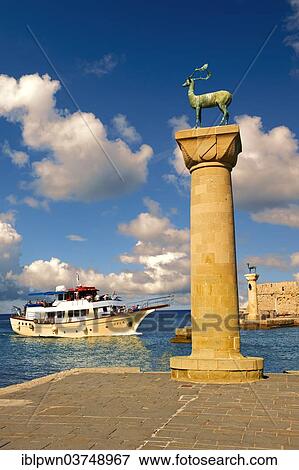 "Column with deer at the entrance to Madraki harbour, the archaic naval docks, Rhodes, Greece, Europe" View Large Photo Image Stock Photo - "Column with deer at the entrance to Madraki harbour, the archaic naval docks, Rhodes, Greece, Europe". Fotosearch