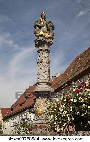 Picture - "Column with figure on the Herrenbrunnen fountain, Rothenburg ob der Tauber, Franconia, Bavaria, Germany, Europe". Fotosearch