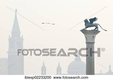 "Column with the Lion of Saint Mark, Leone di San Marco, Piazzetta San Marco, St. Mark's Square, church of San Giorgio Maggiore at back, Venice, Venezia, Veneto, Italy, Europe" View Large Photo Image Stock Image - "Column with the Lion of Saint Mark, Leone di San Marco, Piazzetta San Marco, St. Mark's Square, church of San Giorgio Maggiore at back, Venice, Venezia, Veneto, Italy, Europe". Fotosearch