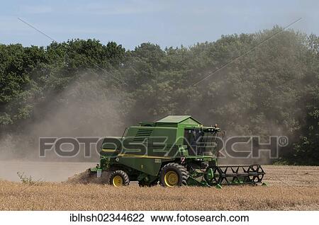 "Combine harvester during the grain harvest, generating a lot of dust, North Rhine-Westphalia, Germany, Europe, PublicGround, Europe" View Large Photo Image Stock Image - "Combine harvester during the grain harvest, generating a lot of dust, North Rhine-Westphalia, Germany, Europe, PublicGround, Europe". Fotosearch