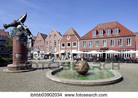 Picture - "Commercial building and Marktbrunnen fountain, Coesfeld, Munsterland, North Rhine-Westphalia, Germany, Europe". Fotosearch