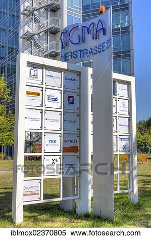 Stock Photography - "Company signs, Sigma office building, Lyoner Strasse street, Niederrad business district, Frankfurt am Main, Hesse, Germany, Europe, PublicGround, Europe". Fotosearch