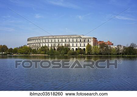 "Complete view of the former unfinished Congress Hall of the NSDAP 1933-1945, Dutzendteich pond at the front, Documentation Centre, Nazi Party Rally Grounds, Nuremberg, Middle Franconia, Bavaria, Germany, Europe" View Large Photo Image Stock Image - "Complete view of the former unfinished Congress Hall of the NSDAP 1933-1945, Dutzendteich pond at the front, Documentation Centre, Nazi Party Rally Grounds, Nuremberg, Middle Franconia, Bavaria, Germany, Europe". Fotosearch