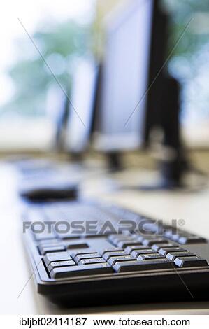 Computer monitors, keyboards and mouse in a training classroom View Large Photo Image Stock Photo - Computer monitors, keyboards and mouse in a training classroom. Fotosearch