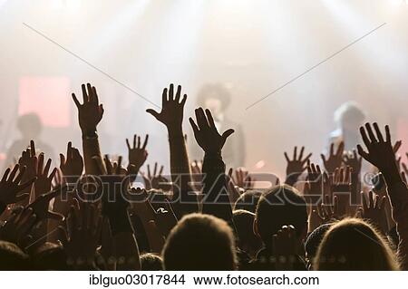 "Concertgoers stretching their hands in the air at the concert of the Swiss pop band Pegasus, live in Schueuer concert hall, Luzern, Luzern, Canton of Lucerne, Switzerland, Europe" View Large Photo Image Picture - "Concertgoers stretching their hands in the air at the concert of the Swiss pop band Pegasus, live in Schueuer concert hall, Luzern, Luzern, Canton of Lucerne, Switzerland, Europe". Fotosearch
